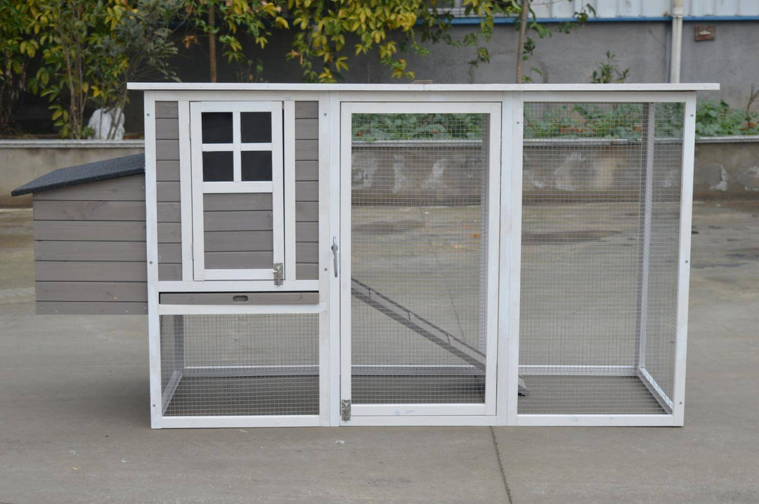 Large grey chicken coop and rabbit hutch with mesh wire and removable features, perfect for outdoor pets.