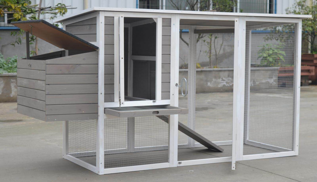 Large grey chicken coop and rabbit hutch with nesting box and mesh wire, suitable for up to 6 chickens.