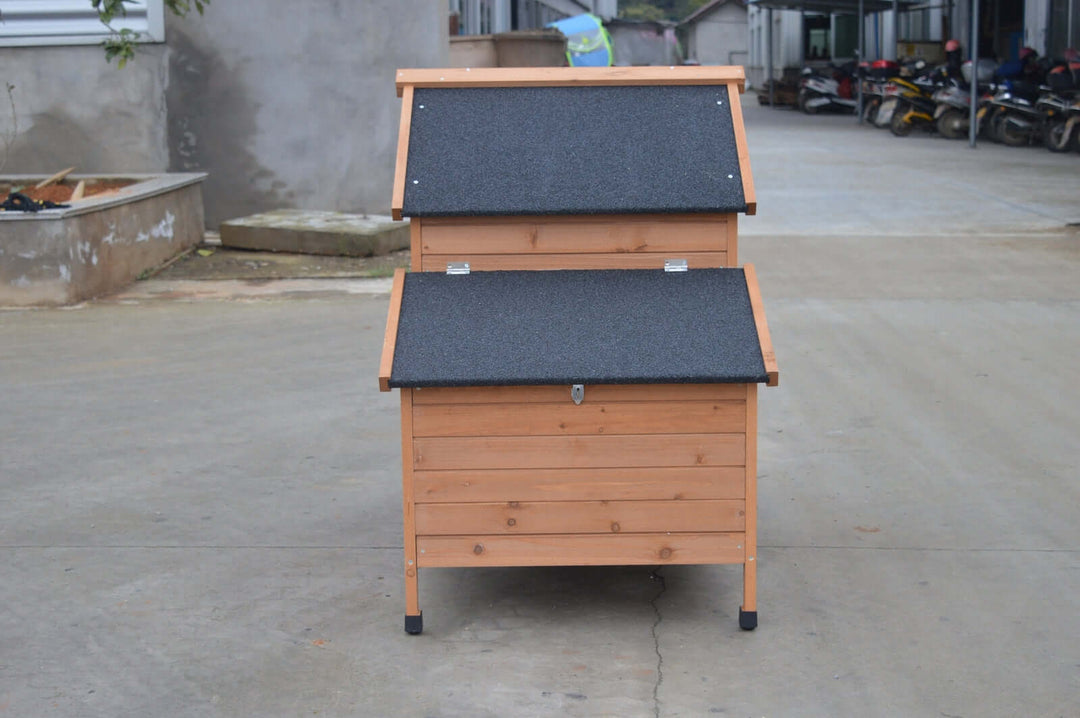 Affordable DIY Brown Chicken Coop with asphalt roof for heat protection and easy cleaning features.