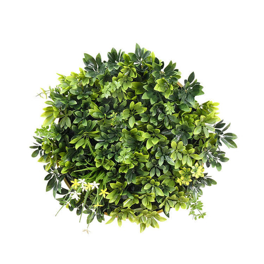 Top view of a lush artificial green wall plant panel featuring vibrant leaves and flowers, ideal for affordable DIY decor.