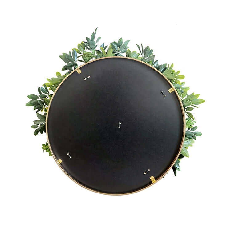 Top view of a 50cm artificial green wall plant disc featuring leafy greens and a durable black frame.