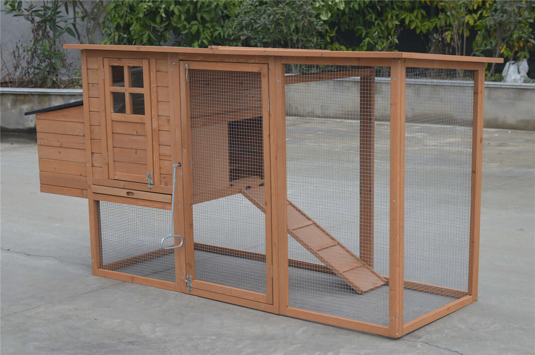 Large chicken coop rabbit hutch with mesh wire and wooden structure, suitable for various pets.