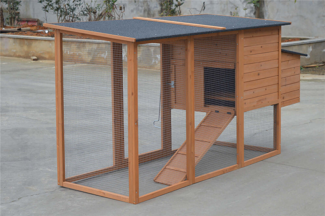 Large chicken coop rabbit hutch with mesh wire, solid wood, and removable ramp, perfect for pets.