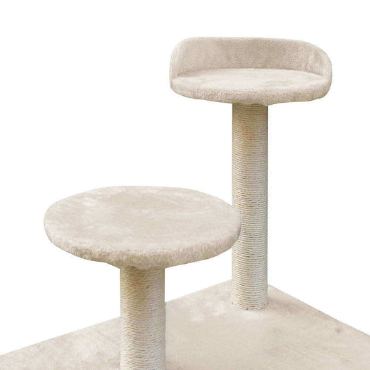 Beige multi-level cat scratching post with soft platforms for lounging and scratching.