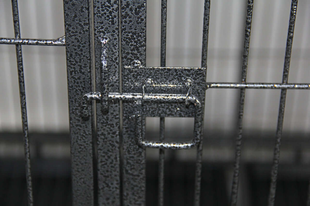 Close-up of YES4PETS XXL pet cage latch, showcasing durable metal construction and secure locking mechanism for safety.