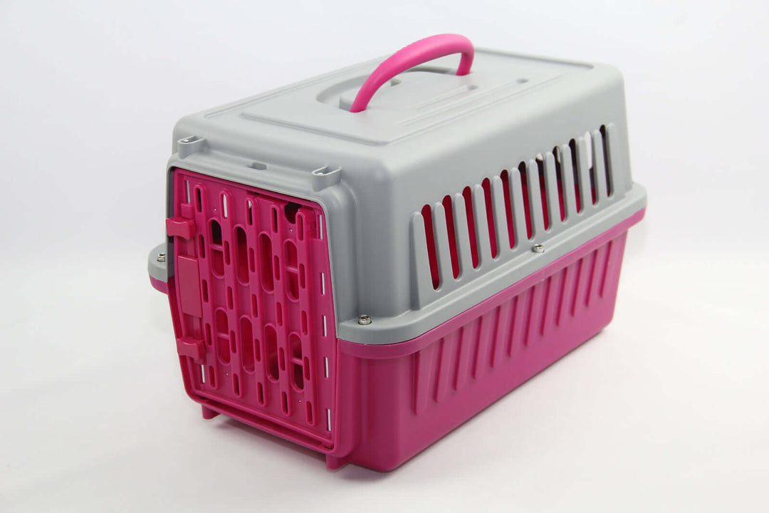 YES4PETS small pet carrier in pink and gray, ideal for dogs, cats, rabbits, and guinea pigs, featuring ventilation and ergonomic handle.