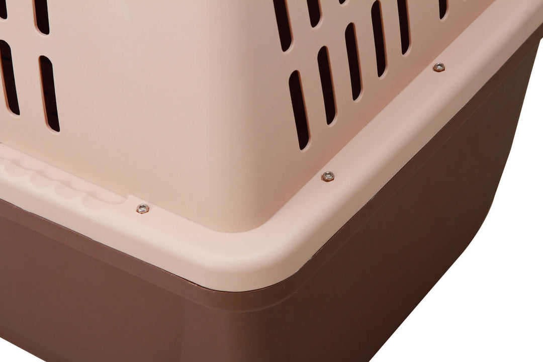 Close-up of YES4PETS XL Plastic Kennel showing sturdy, durable design with ventilation holes and screw fastening features.