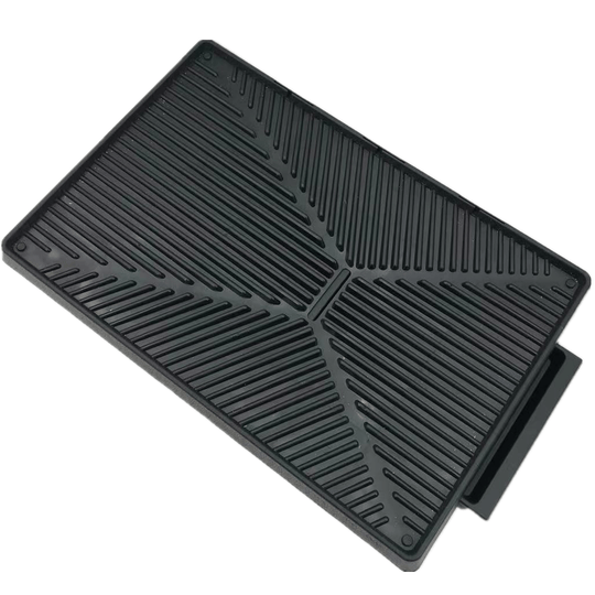 Durable black dog potty training mat with ridged surface, perfect for indoor use and easy cleaning.