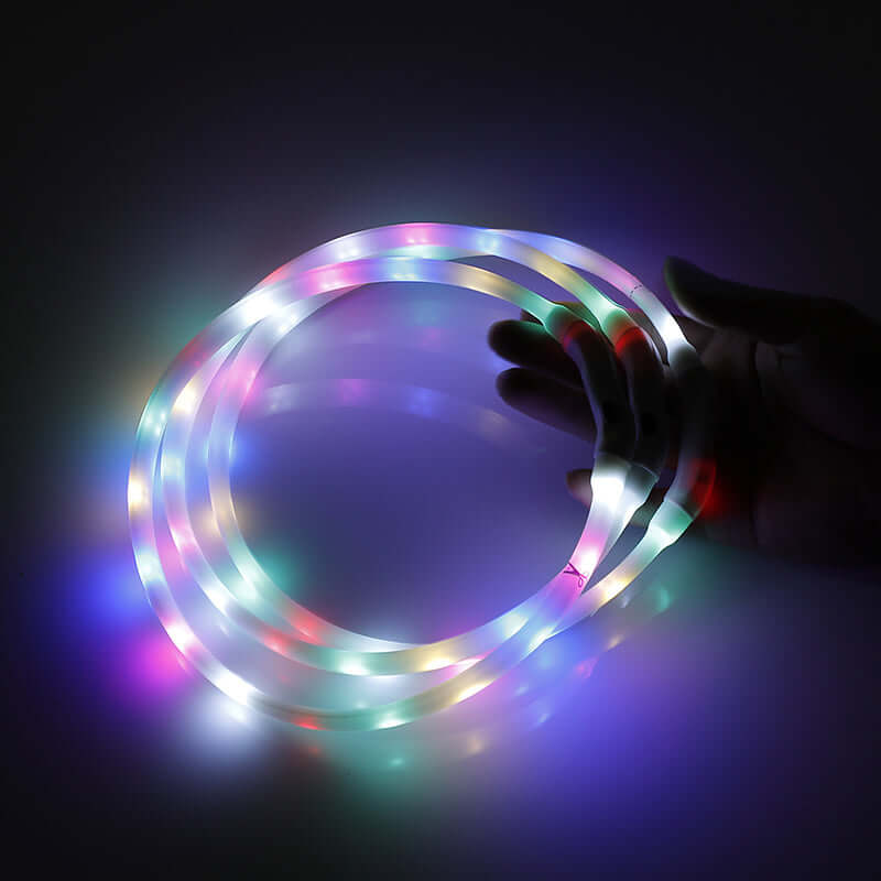 Colorful LED strip lights in hand, perfect for DIY projects and decorative lighting.