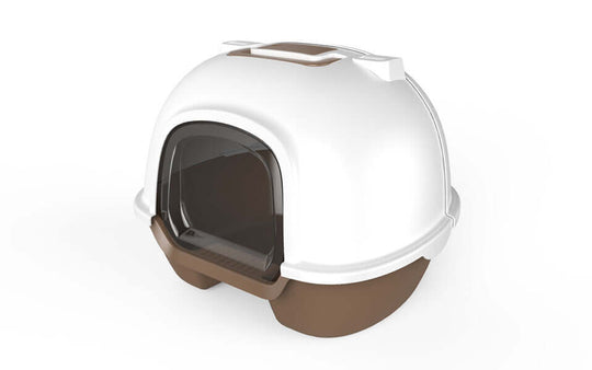 Portable hooded cat litter box in brown and white, designed to contain litter and prevent odors, featuring a scoop and handle.