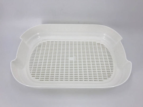 Affordable white plastic litter box tray with breathable design for easy cleaning and odor control.