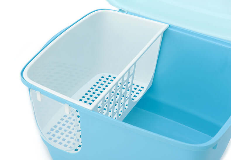 Blue portable cat litter box interior with a removable divider for easy access and cleaning. Quality design for pet privacy.