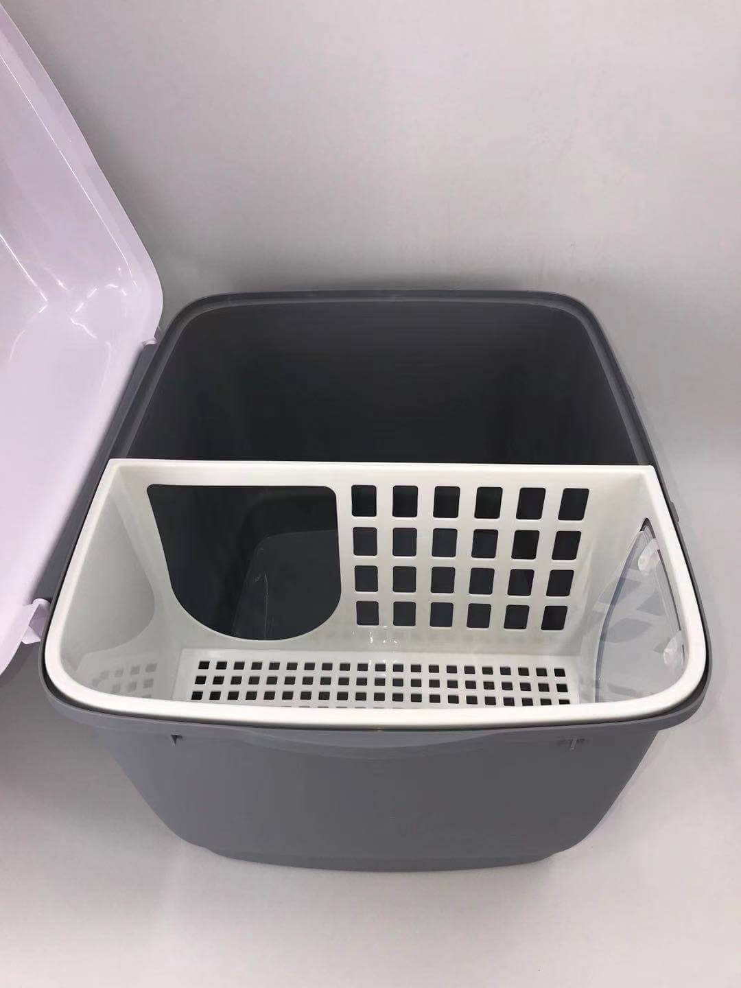 Interior view of YES4PETS XL Portable Hooded Cat Toilet, featuring a divided tray for efficient litter management.