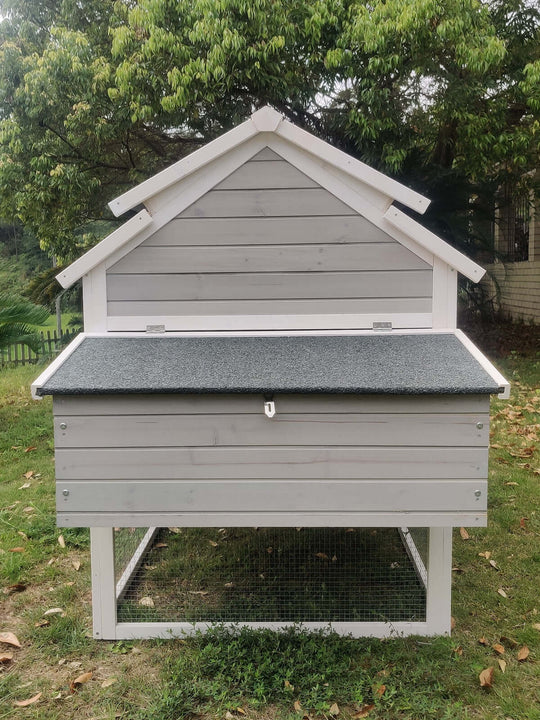 Affordable grey chicken coop with sloped roof, suitable for rabbits, guinea pigs, and ferrets.