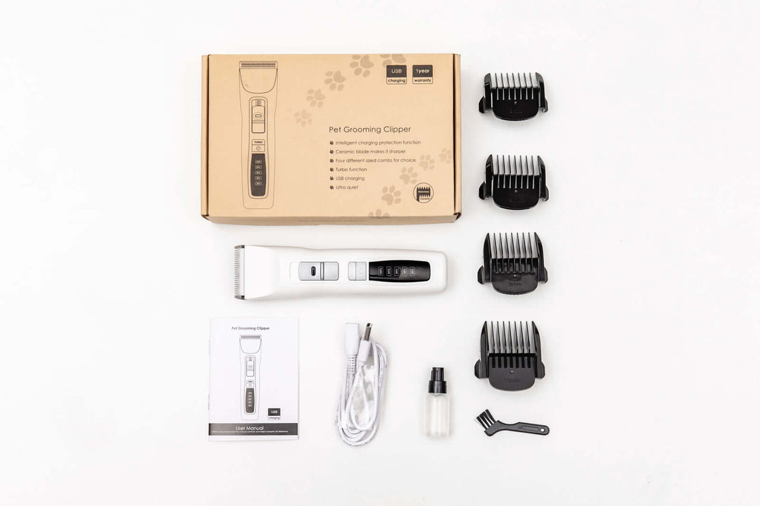 YES4PETS cordless pet grooming clipper kit with attachments, combs, and manual for DIY haircuts at home.