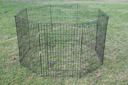 Affordable 42' black dog and cat playpen on grass, customizable 8-panel enclosure for pets.