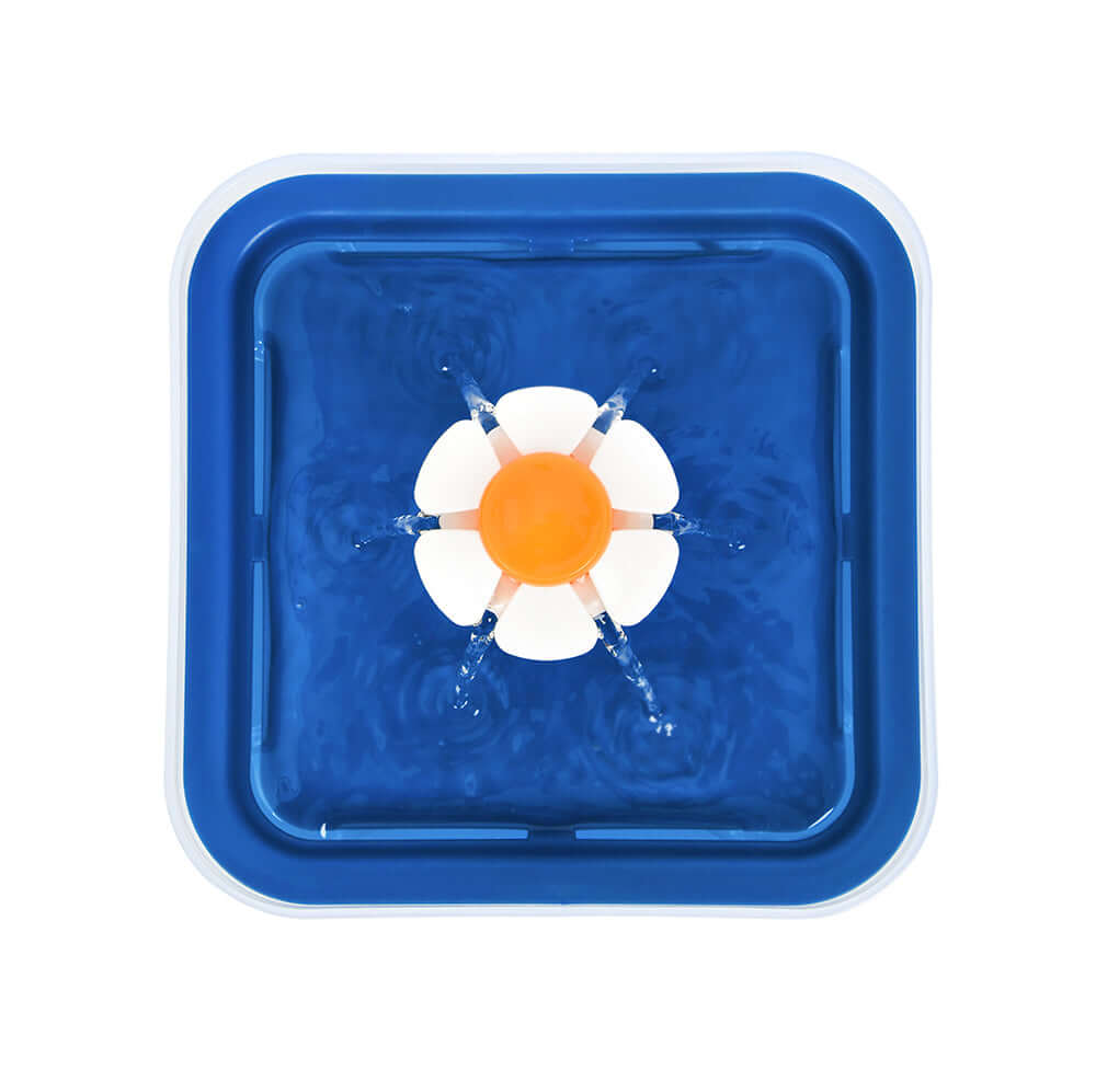 YES4PETS automatic pet water fountain with flower design and blue water, ideal for dogs and cats.