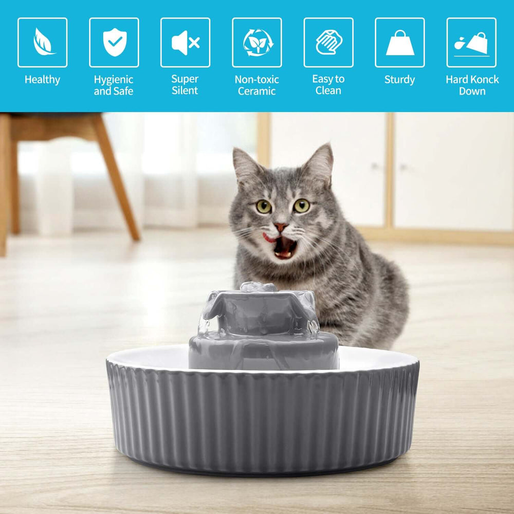 Grey ceramic electric pet water fountain with a cat, showcasing a stylish design for healthy hydration.