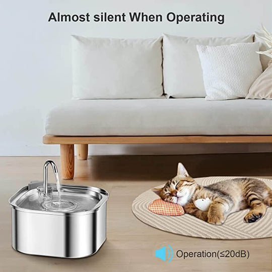 YES4PETS stainless steel pet water fountain, almost silent, with cat resting nearby on a cozy mat.