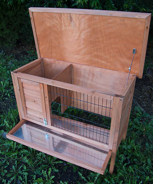 Single wooden pet rabbit hutch with slide-out tray, spacious design for rabbits and guinea pigs, offering affordability and quality.