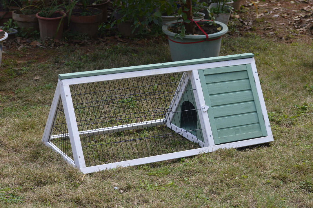 Affordable YES4PETS rabbit hutch and guinea pig cage with access door on grass outdoor setting.