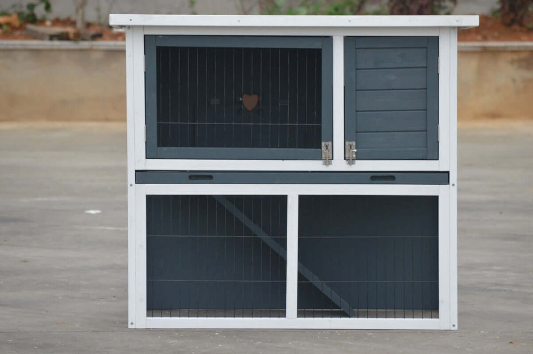 Double storey rabbit hutch guinea pig cage with pull out tray and heart-shaped design.