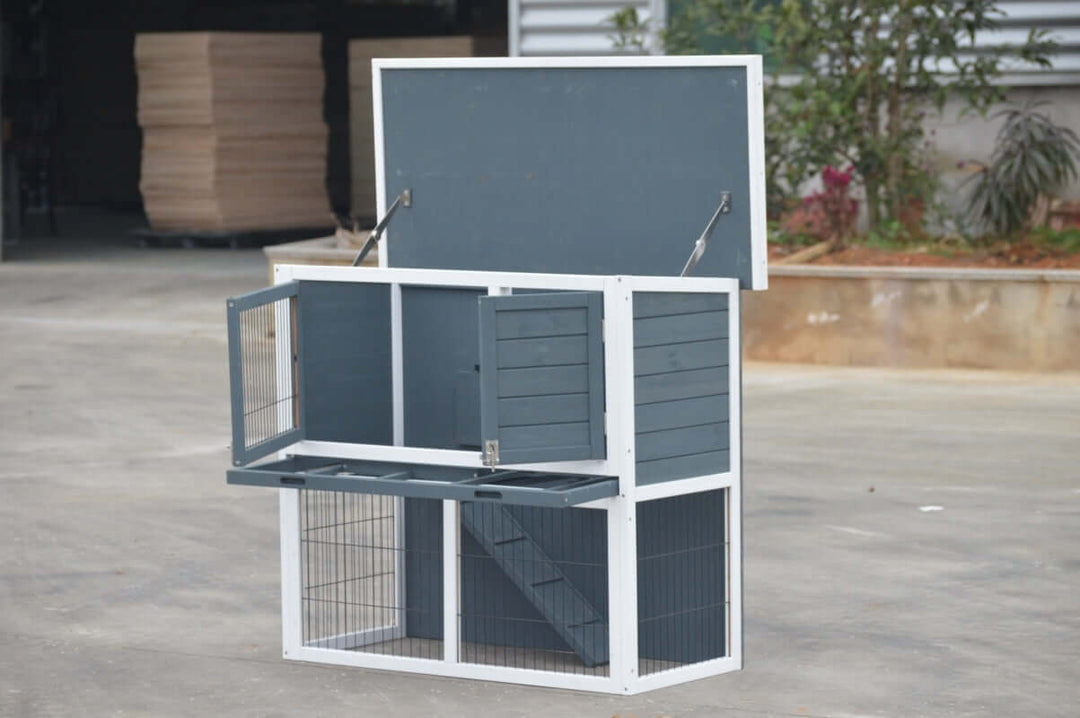 Affordable double storey rabbit hutch with pull-out tray and hinged roof for easy cleaning.