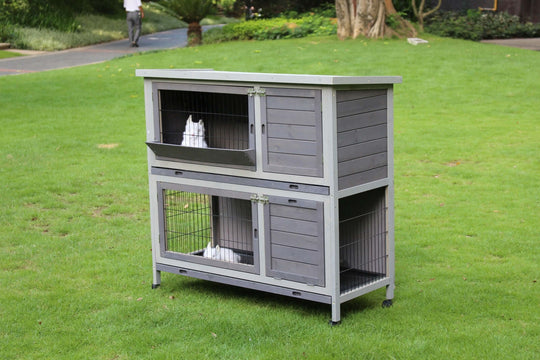 YES4PETS 110cm XL Double Storey Rabbit Hutch and Guinea Pig Cage on grass, featuring pulled out tray and wheels.