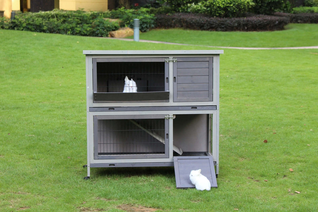 YES4PETS 110cm XL Double Storey Rabbit Hutch in a grassy yard, suitable for small pets like rabbits and guinea pigs.