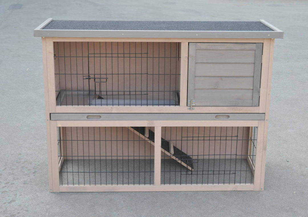 Double storey rabbit hutch and guinea pig cage with pull-out tray, ideal for small pets, featuring waterproof treatment and access doors.