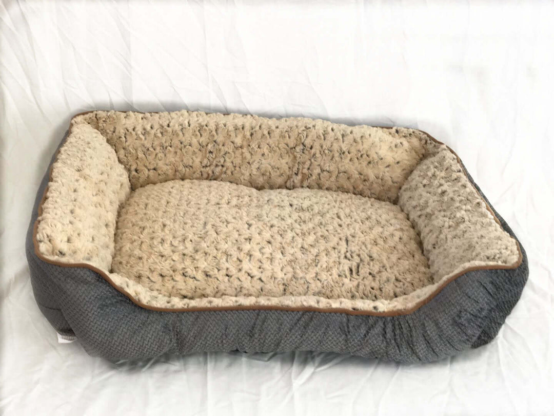 Large grey pet bed cushion for dogs and cats, soft fleece surface, washable and durable, affordable quality comfort.