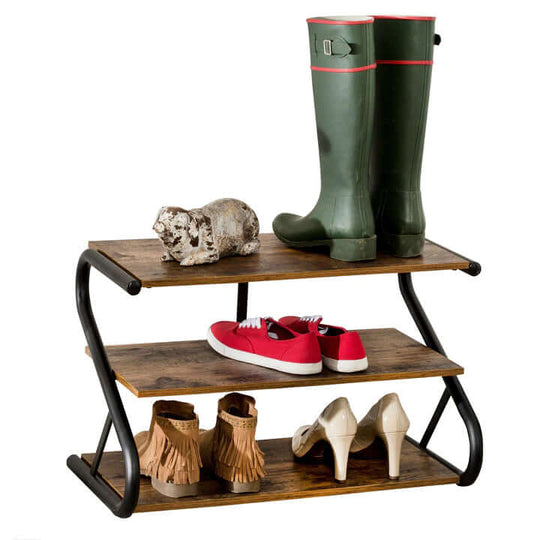 Affordable 3-tier rustic shoe rack with matte black frame, showcasing boots, sneakers, and elegant heels for stylish storage.