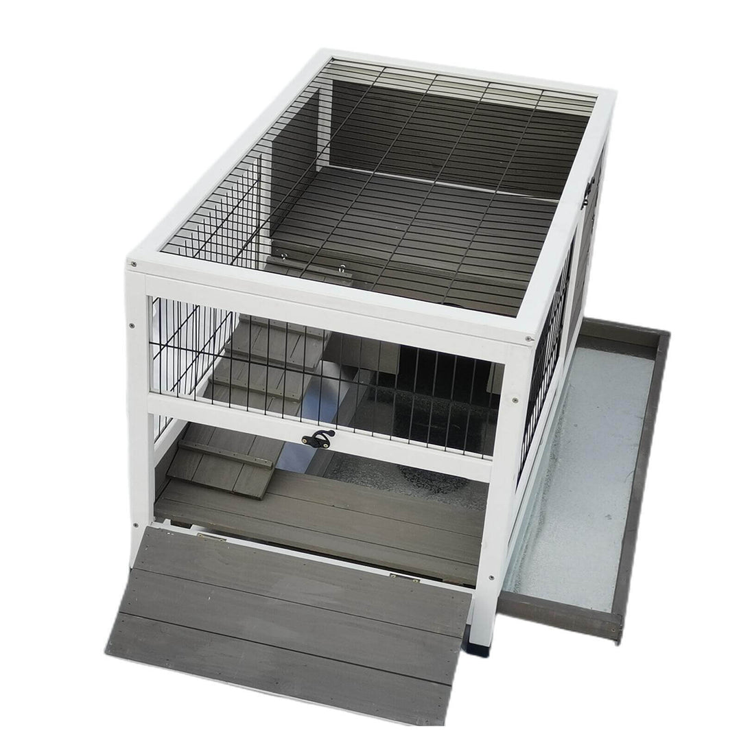 Spacious YES4PETS rabbit hutch with ramp and waterproof features for small animals like cats and guinea pigs.