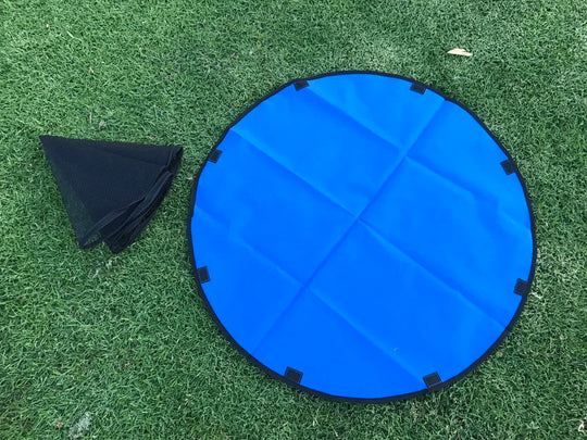 YES4PETS blue round pet playpen mat with black storage corners on grass, ideal for small pets and play areas.