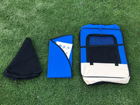 YES4PETS medium blue pet tent playpen components laid out on grass, showcasing affordable, quality design for pets.