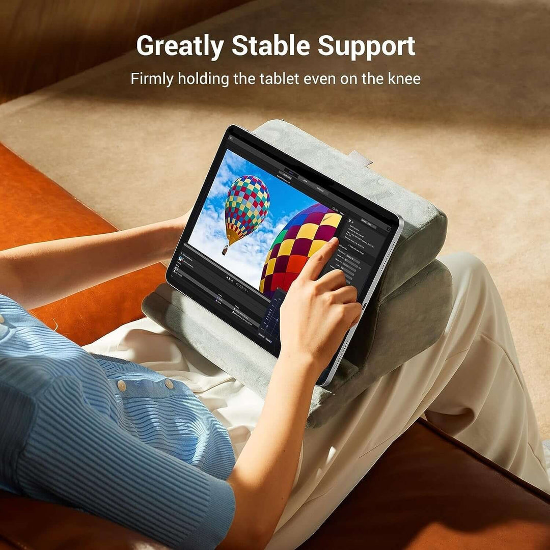 UGREEN 60646 desk pillow tablet stand providing stable support on a lap, ideal for travel with affordable quality.