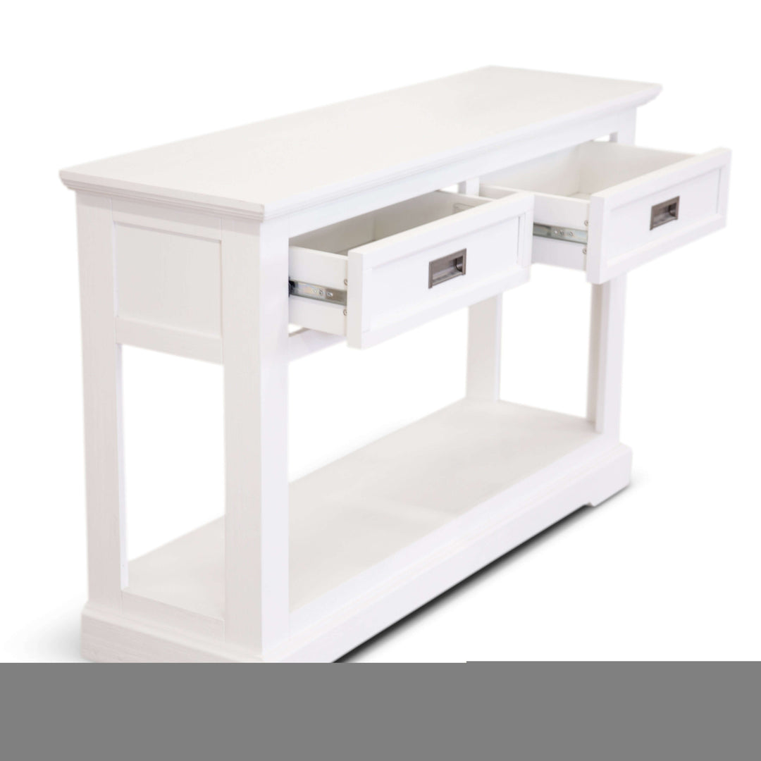 Laelia console table in white, featuring two drawers and open shelf, crafted from solid acacia wood for durable, stylish storage.