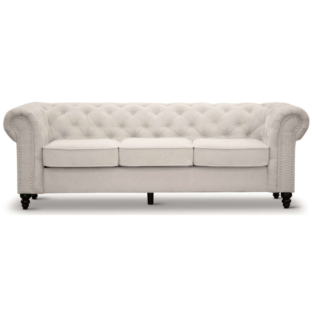 Affordable beige 3-seater Chesterfield sofa with button tufting and rolled arms for stylish living room decor.