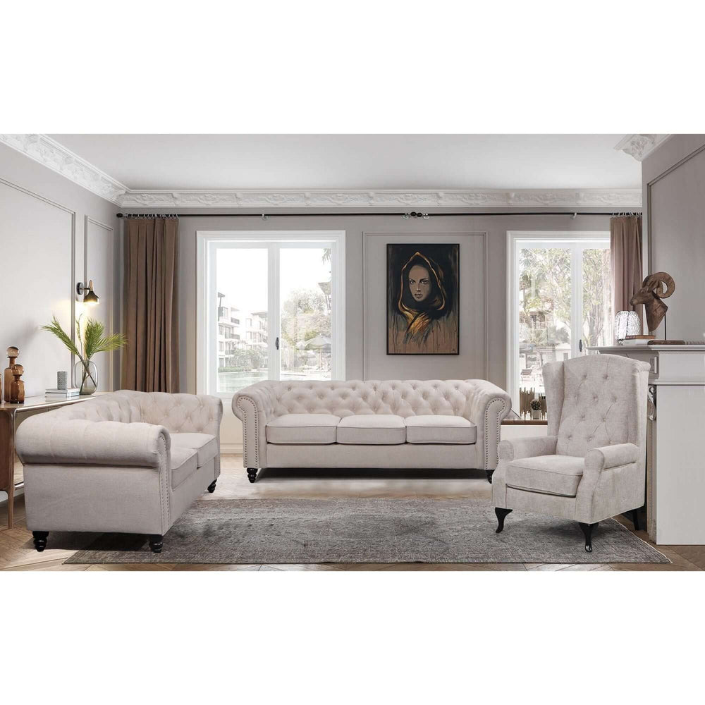 Stylish beige 3-seater Chesterfield sofa with button tufting in elegant living room setting. Affordable luxury for home decor.