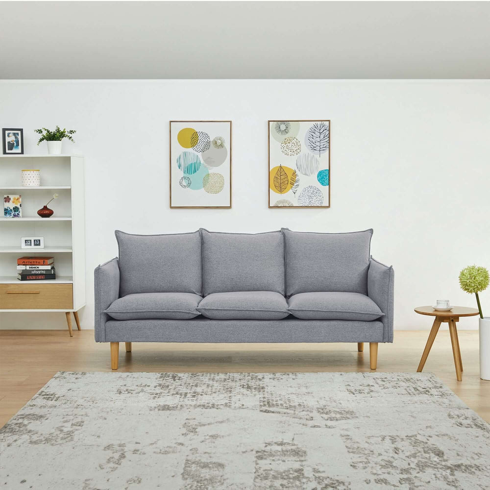 Stylish grey 2+3 seater fabric sofa in a modern lounge setting, featuring Scandinavian design and plush upholstery.