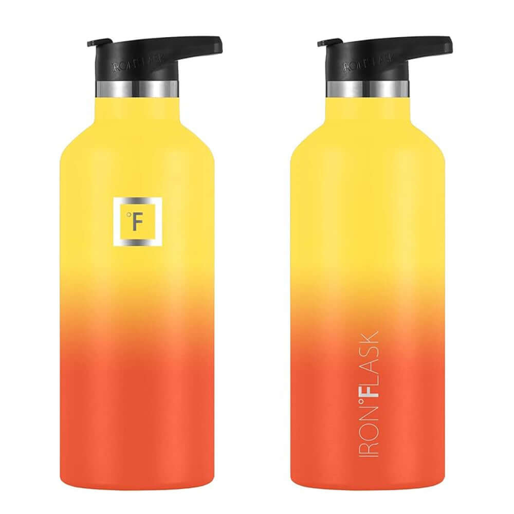 Iron Flask 64oz narrow mouth bottle in vibrant fire gradient design with straw lid for leak-proof convenience.