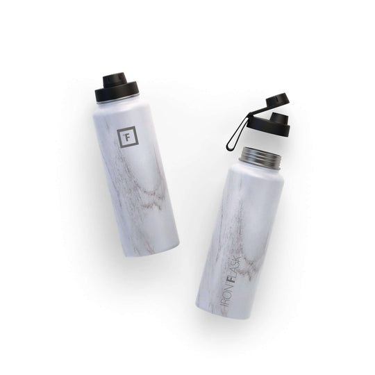 Iron Flask 40oz Wide Mouth Bottle in Carrara Marble, featuring spout lid, stylish and affordable water bottle.