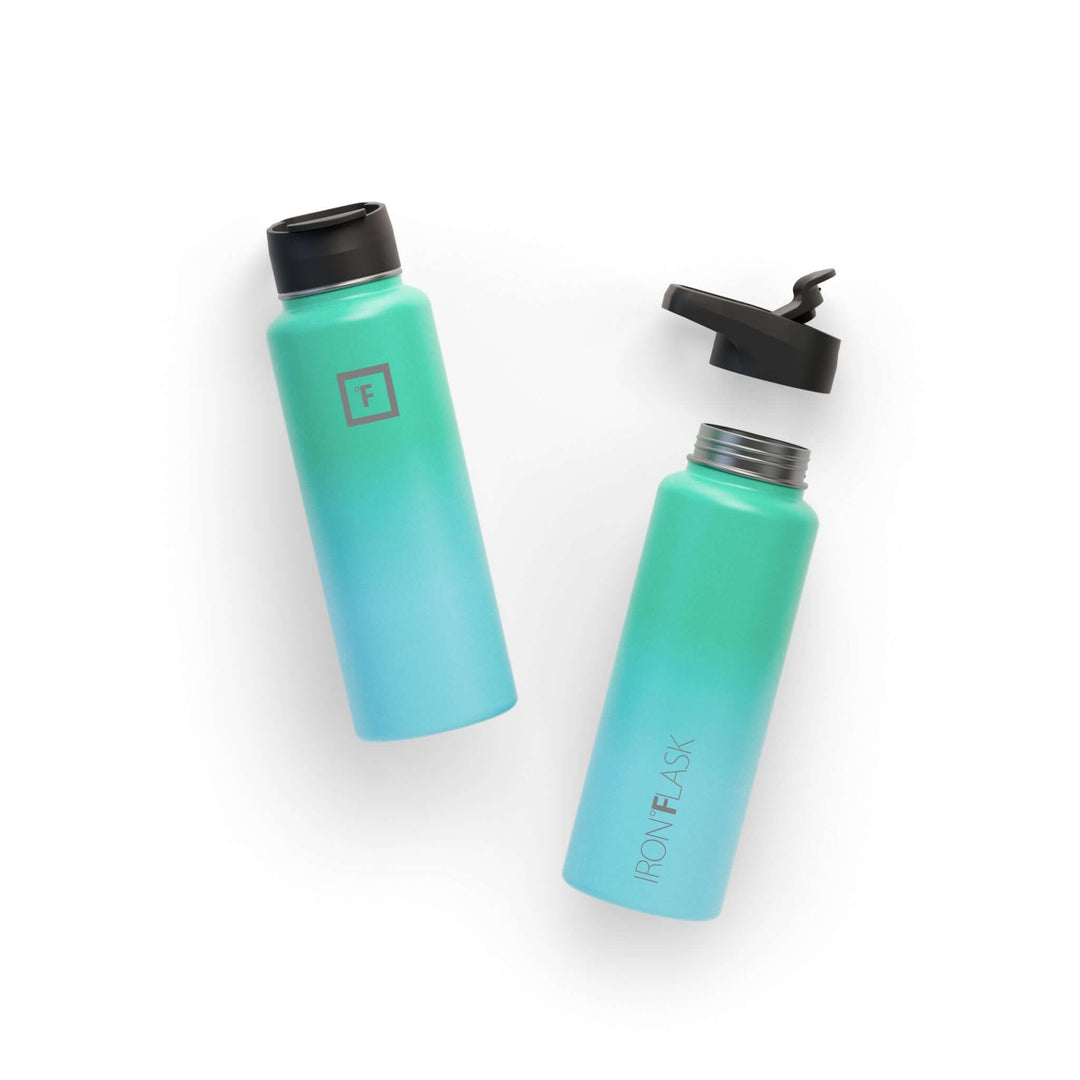 Iron Flask wide mouth water bottle in sky color, 40oz, featuring a spout lid, ideal for stylish hydration.