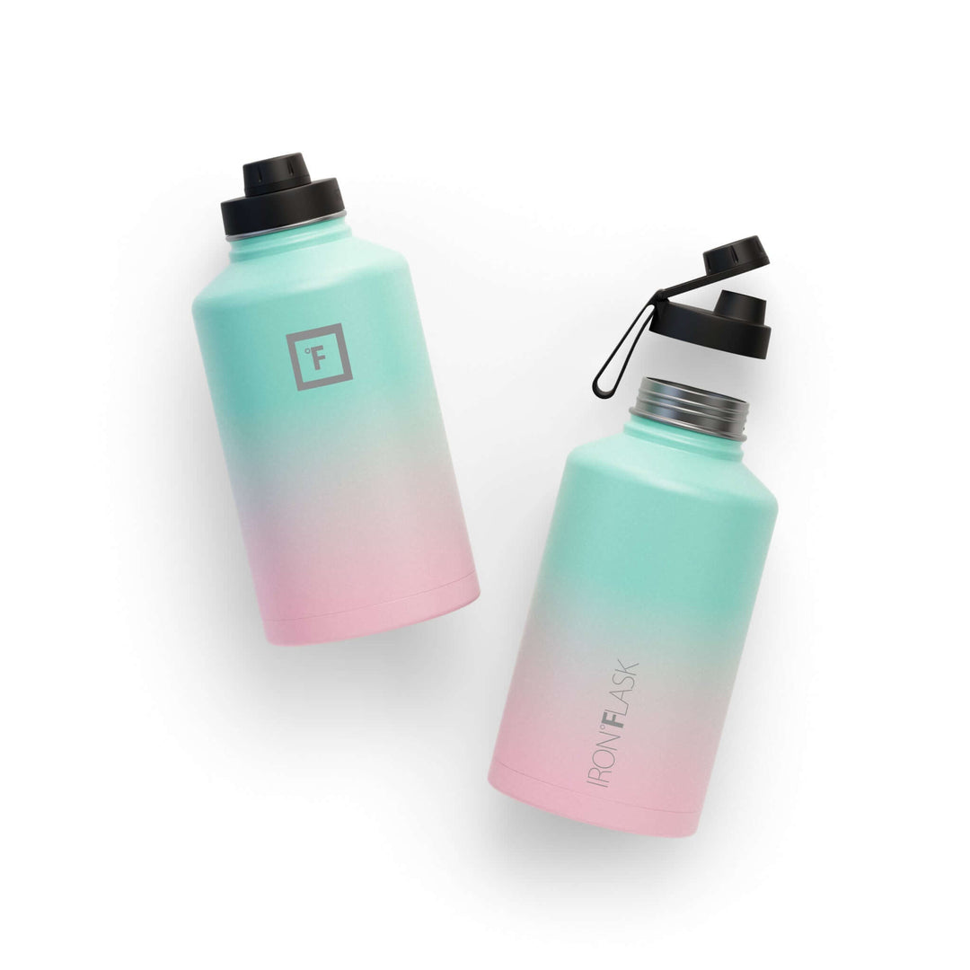 Iron Flask Wide Mouth Bottle in Bubble Gum color, 64oz, with spout lid, double-walled insulation for durability.