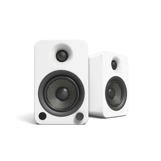 Kanto YU4 powered bookshelf speakers in matte white, featuring 4" drivers and Bluetooth connectivity for rich sound.