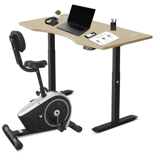 Lifespan Fitness Cyclestation 3 exercise bike and ErgoDesk automatic standing desk in oak and black for productive workspace.