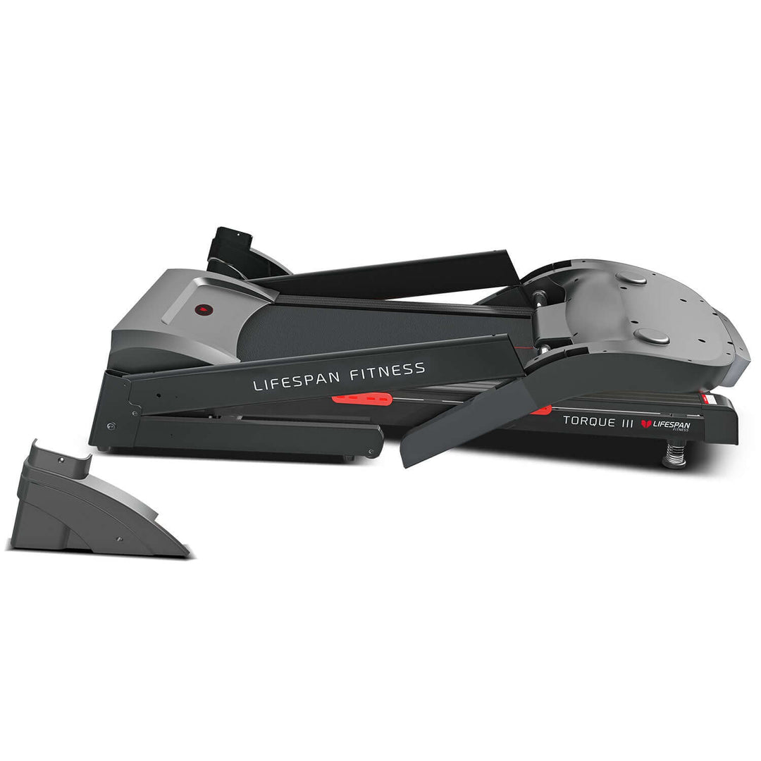 Lifespan Fitness Torque 3 treadmill folded, showcasing affordable quality and space-saving design for home workouts.