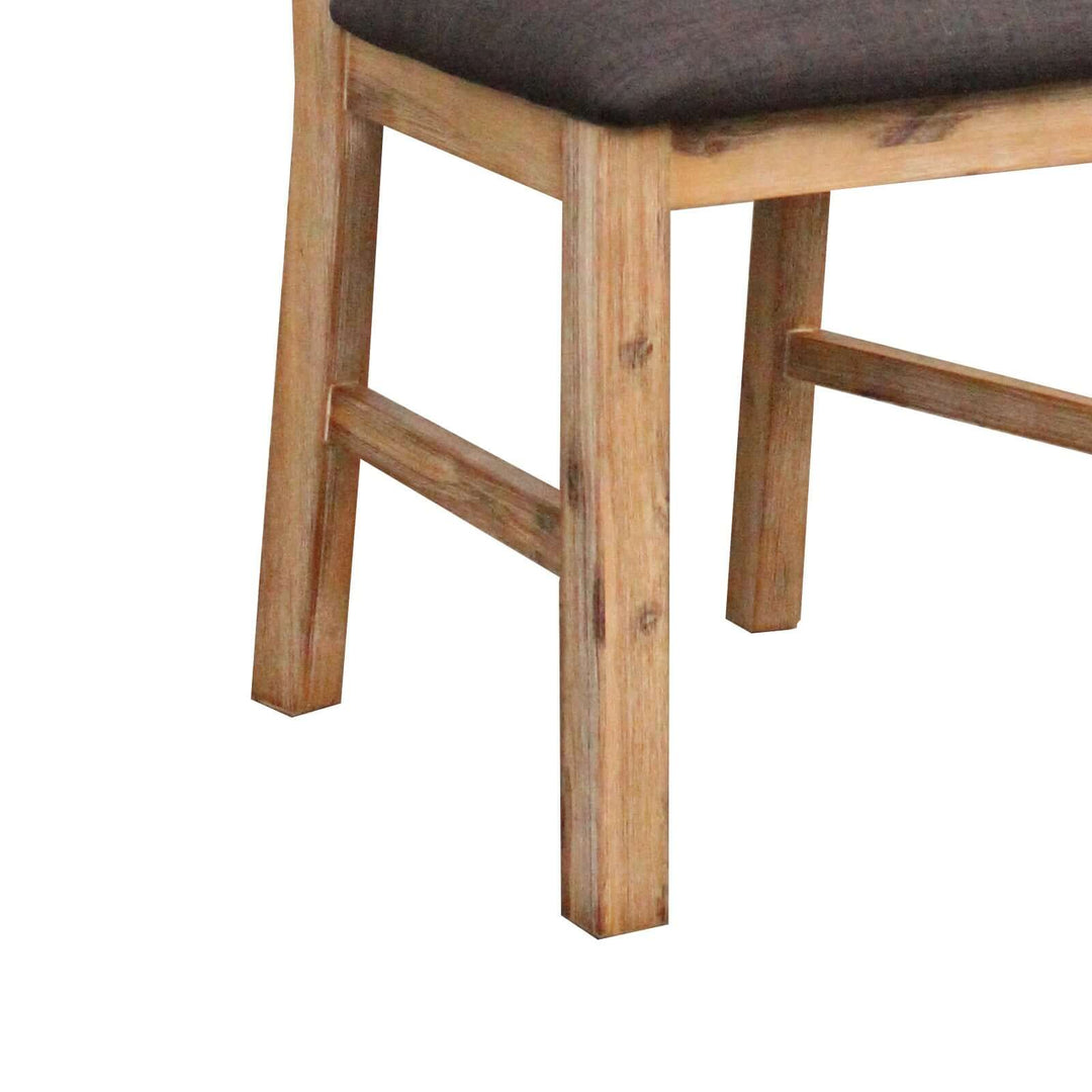 Wooden frame dining chair with padded fabric seat in Oak colour, made from solid Acacia timber for a strong and sturdy vintage look.