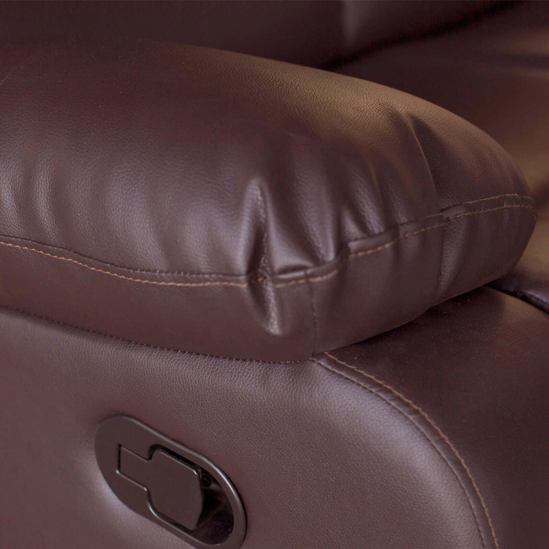 Close-up of plush brown faux leather armrest on a 3 seater recliner sofa, showcasing quality cushioning and comfort.