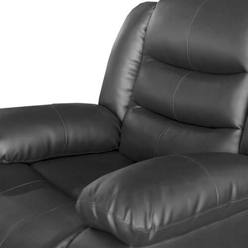 Close-up of a black faux leather recliner sofa showcasing plush cushions and spacious armrests for quality comfort.